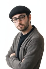 Obraz premium Professional artist with a thoughtful expression wearing a beret and glasses on a clean white background