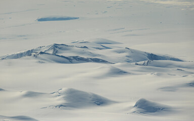 Aerial view of white landscape of Antarctica.
