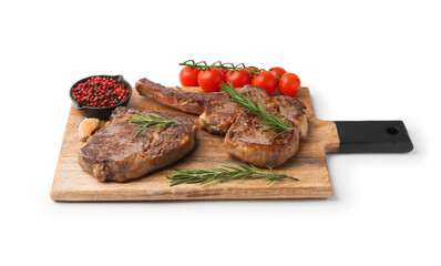 Pieces of delicious beef meat, spices and tomatoes isolated on white
