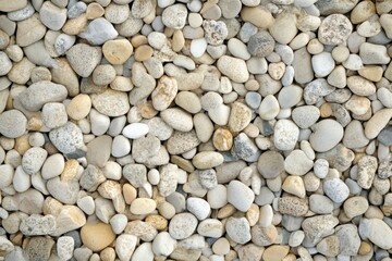 Naklejka premium Unique pebbled beach background with soft focus and realistic lighting for creative projects