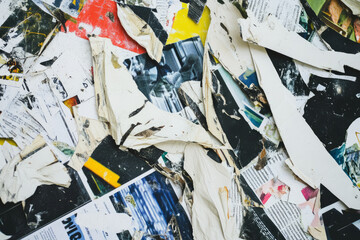 A chaotic risograph newspaper collage with bold headlines, torn paper textures, and high-contrast grain effects.