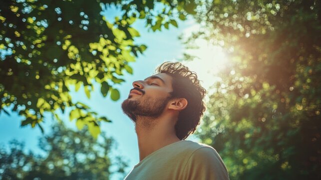man breathing fresh air outdoors