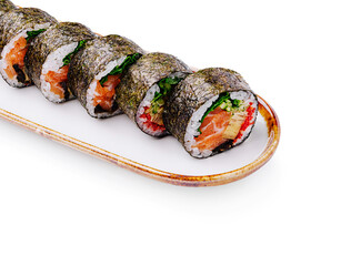 Fresh sushi rolls with salmon and vegetables on a plate