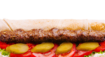 Delicious kebab sandwich with fresh vegetables and sauce