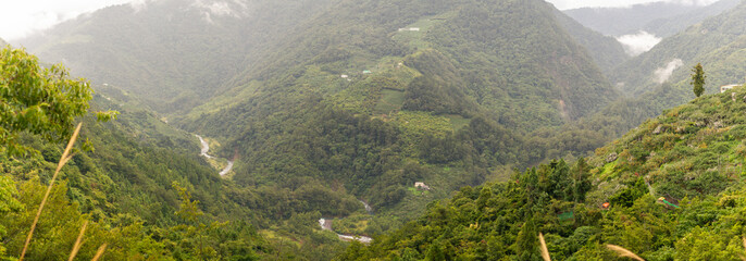 Verdant Mountain Valleys with Meandering River and Misty Peaks Showcasing Taiwan’s Rural Tranquility and Beauty