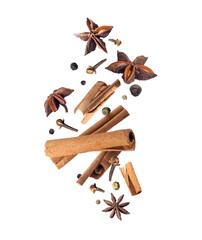Dry various spices for making mulled wine in the air on a transparent background