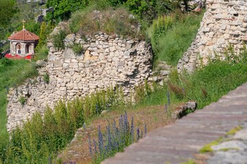 Medieval fortress - castle. View of the ruins and architectural elements of the old medieval...