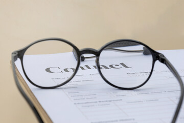 contract paper viewed from eyeglasses