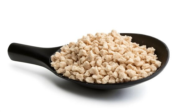 Textured vegetable protein in a black spoon against white background