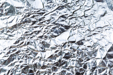 Abstract crumpled silver paper texture background, blank wrinkle paper pattern background