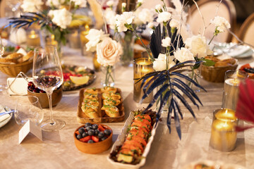 delicious food in a restaurant at a banquet with festive decoration