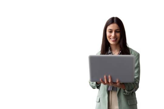 Ambitious Latina business leader working on a laptop while carrying it
