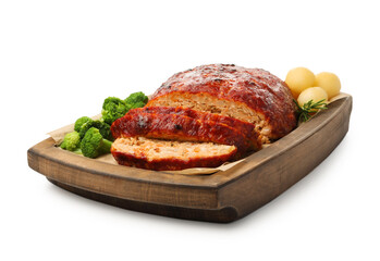 Delicious turkey meatloaf with vegetables isolated on white