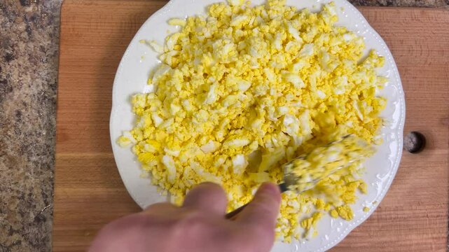 boiled chicken egg halves with bright yolks are