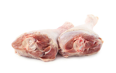 Two raw turkey drumsticks isolated on white