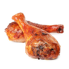 Delicious baked turkey drumsticks isolated on white