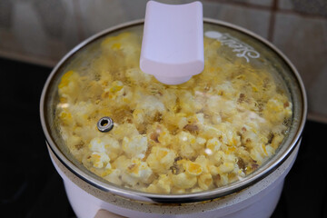 Making popcorn in non-stick frying pan.