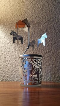 Dalecarlian horse, rotating candle holder. Vertical footage