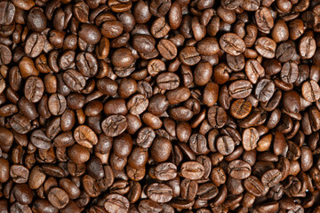 Decaffeinated coffee beans roasted close up