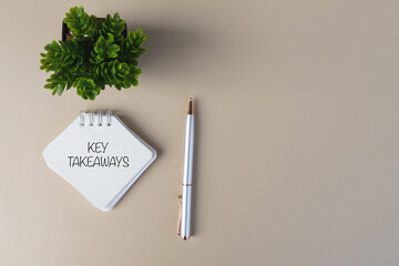 Key Takeaways Written on a Note – Office Desk Setup