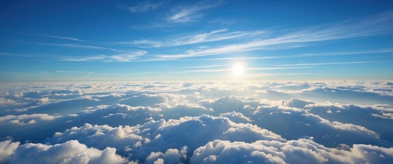Blue sky with white clouds and bright sunlight during a clear day captured from an elevated perspective.