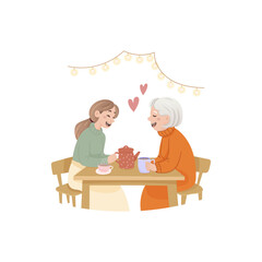Mother's Day. Mother and daughter adults drinking tea. Grandmother and mother.