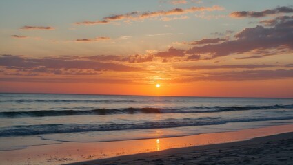 Naklejka premium Sunset over the ocean with vibrant colors reflecting on calm waves and sandy beach during twilight hours