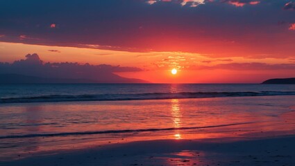 Obraz premium Colorful sunset over the ocean with reflection on wet sand and silhouettes of distant hills in the background