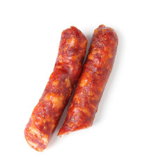 Pieces of delicious thin dry cured sausage isolated on white, top view
