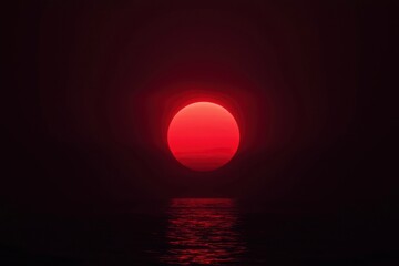 Red sun setting over calm ocean, peaceful seascape for backgrounds