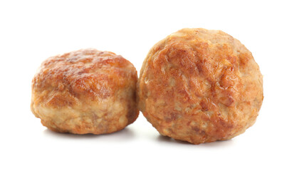 Two tasty cooked meatballs isolated on white