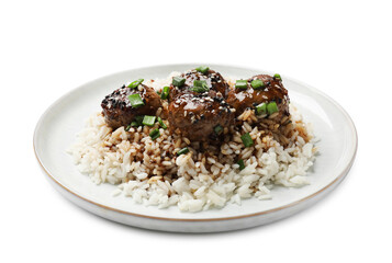 Delicious rice with meatballs, sauce and green onions isolated on white