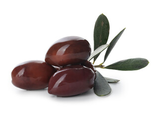 Delicious marinated black olives and leaves isolated on white
