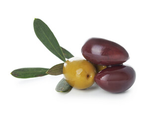 Delicious marinated olives and leaves isolated on white