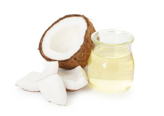 Cooking oil in glass jar and pieces of coconut isolated on white