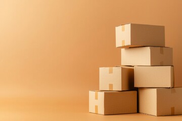 Obraz premium Stacked cardboard boxes on orange background for shipping and delivery