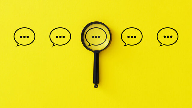 Survey feedback and evaluation feedback. Speech bubble under magnifying lens. Giving opinion on topic of discussion