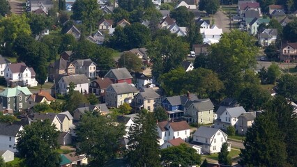 Fototapeta premium Good Living in urban neighborhood homes in Warren, Pennsylvania with historic architecture near Allegheny National Forest and Allegheny river used for boating and fishing 
