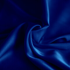 photo of blue silk fabric template of fabric roll of fabric