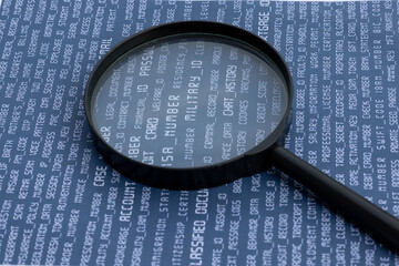 A magnifying glass focusing on a document containing private and classified information,...