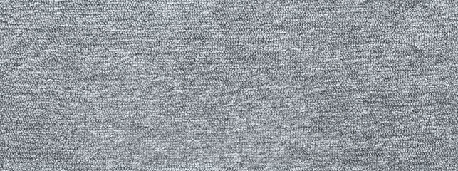 Crisp close-up of a gray low pile carpet with seamless, uniform texture—ideal for modern interior design, product marketing, and architectural presentations.