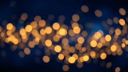 Obraz premium Golden Bokeh Lights on Deep Blue Background – Dreamy and Elegant Blur Effect
