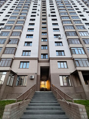 entrance of a new multi-storey building. construction of houses.