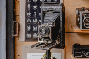 Antique folding camera on display