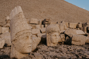 Giant God heads on Mount Nemrut. Anatolia, Turkey. Ancient colossal stone statues representing legendary mythological figures