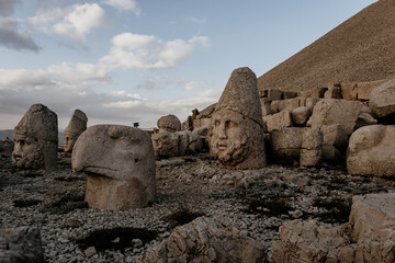 Giant God heads on Mount Nemrut. Anatolia, Turkey. Ancient colossal stone statues representing legendary mythological figures