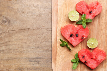 Watermelon on wooden table background