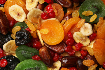 Mix of different dried fruits as background, top view