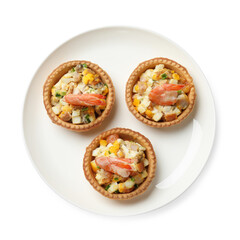 Tartlets with delicious filling isolated on white, top view