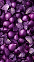 Fototapeta premium Freshly harvested red onions piled together in a vibrant display showcasing their rich colors and textures